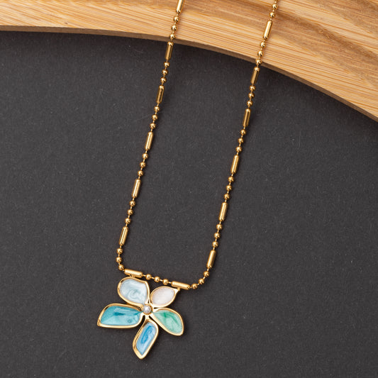 Collier Flora Bleu en acier inoxydable garanti