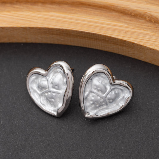 Boucles d'oreilles en acier inoxydable, qualité garantie