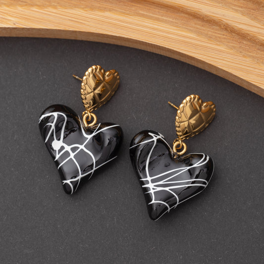 Boucles d'oreilles en acier inoxydable, qualité garantie