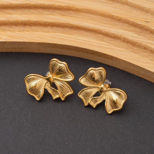 Boucles d'oreilles Papillonne en acier inoxydable, qualité garantie
