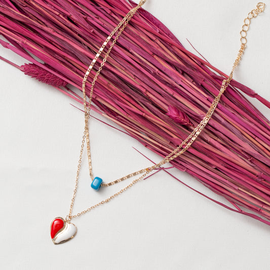 Collier chargé bijoux fantaisie chargé tendance