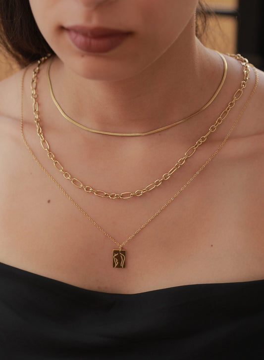 Collier acier garanti inoxydable corp d'une femme