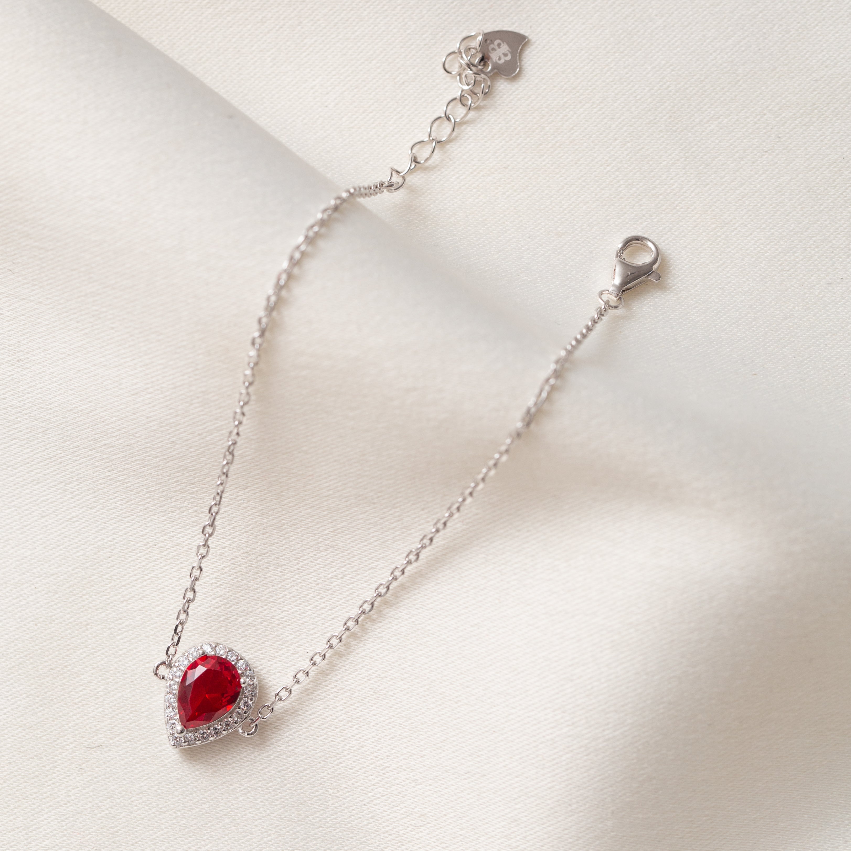 Gourmette argent rhodié tendance avec un motif rouge