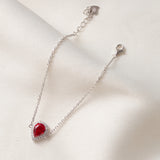 Gourmette argent rhodié tendance avec un motif rouge
