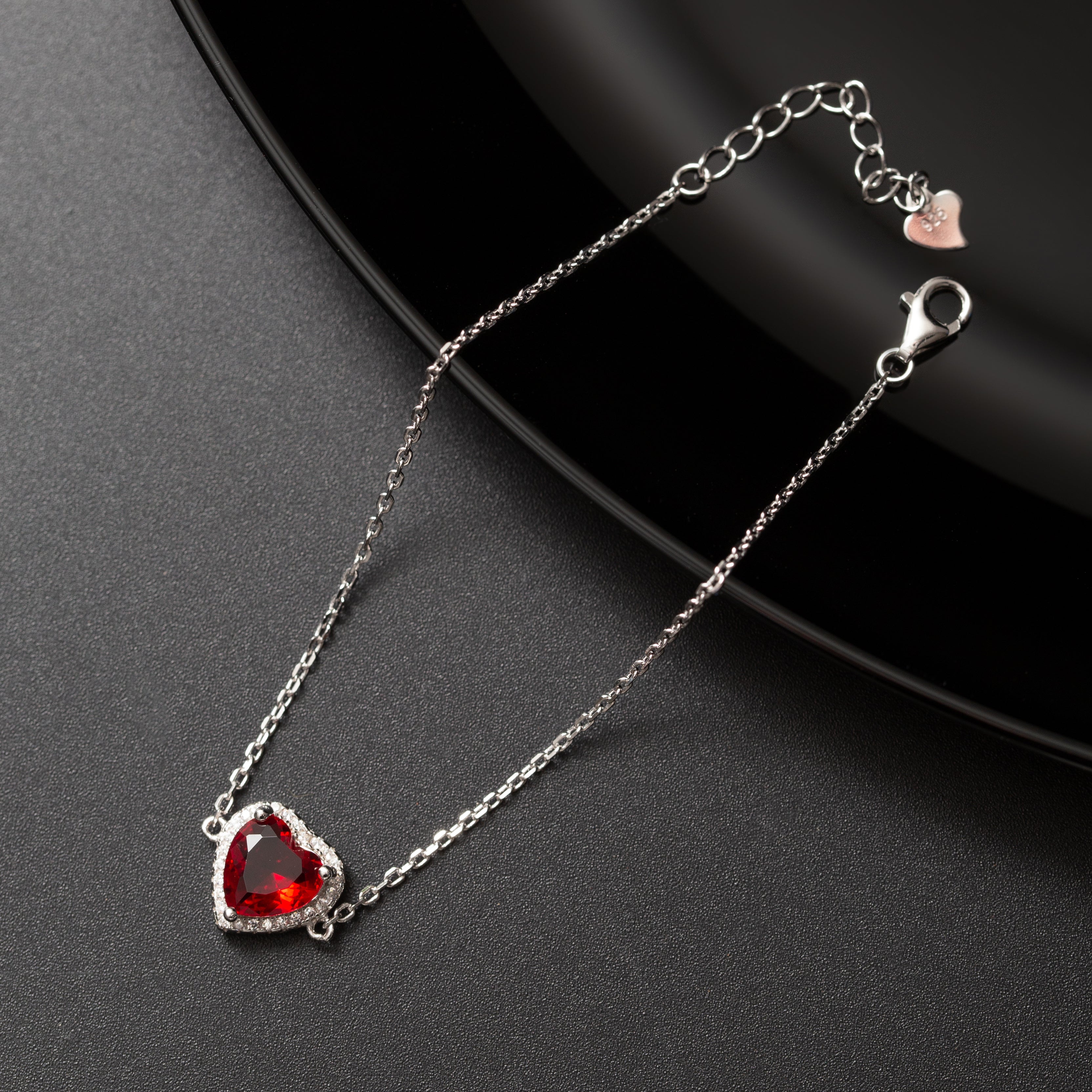 Gourmette argent rhodié tendance avec un cœur rouge