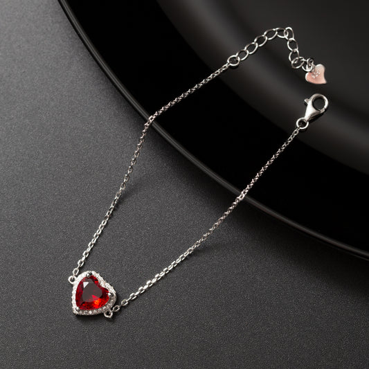 Gourmette argent rhodié tendance avec un cœur rouge