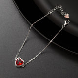 Gourmette argent rhodié tendance avec un cœur rouge