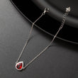 Gourmette argent rhodié tendance avec un motif rouge