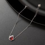 Gourmette argent rhodié tendance avec un motif rouge