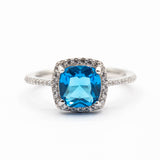 Bague argent Rhodié garanti new avec une pierre Blue ciel carré