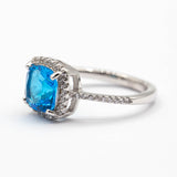 Bague argent Rhodié garanti new avec une pierre Blue ciel carré