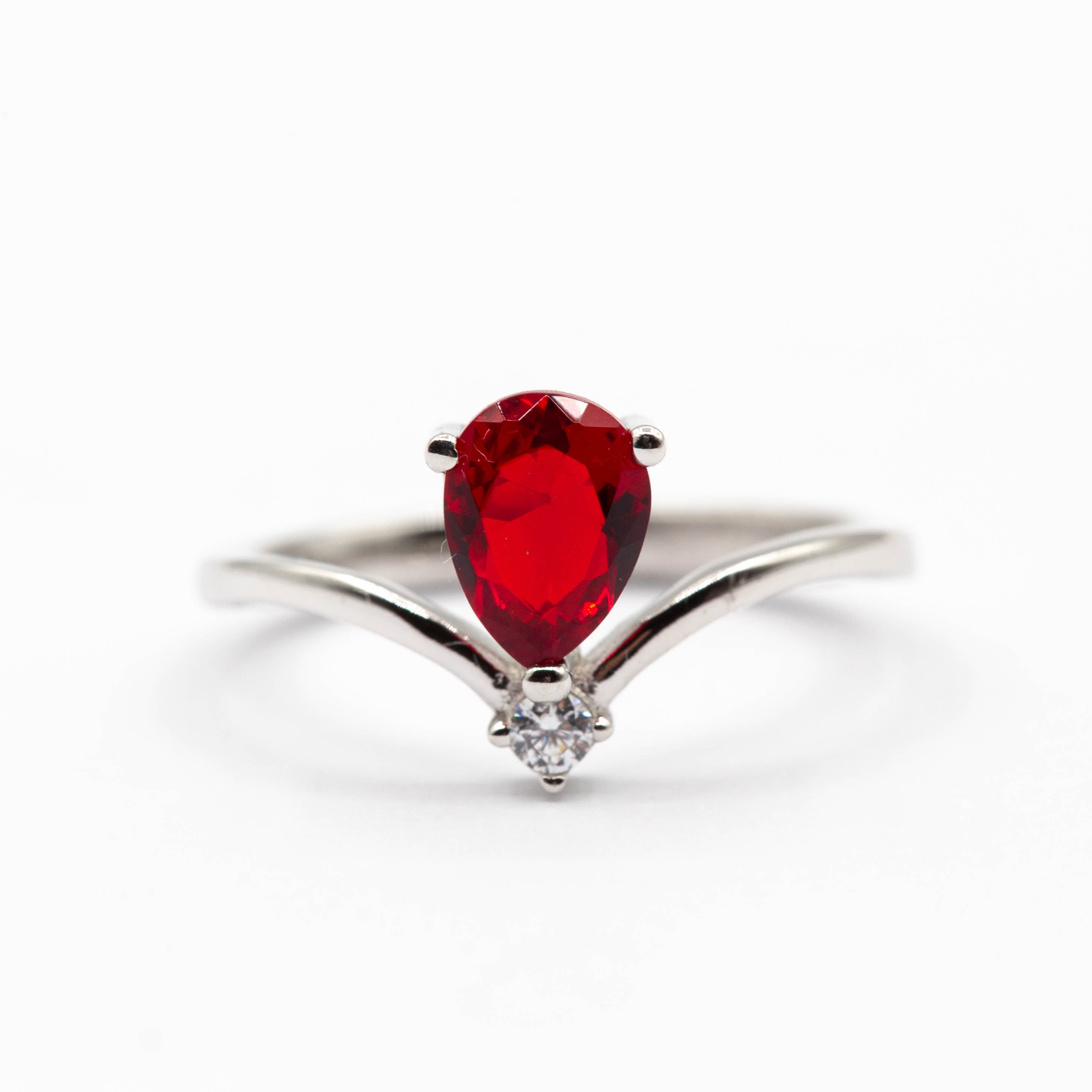 Bague argent Rhodié garanti new avec une pierre Rouge