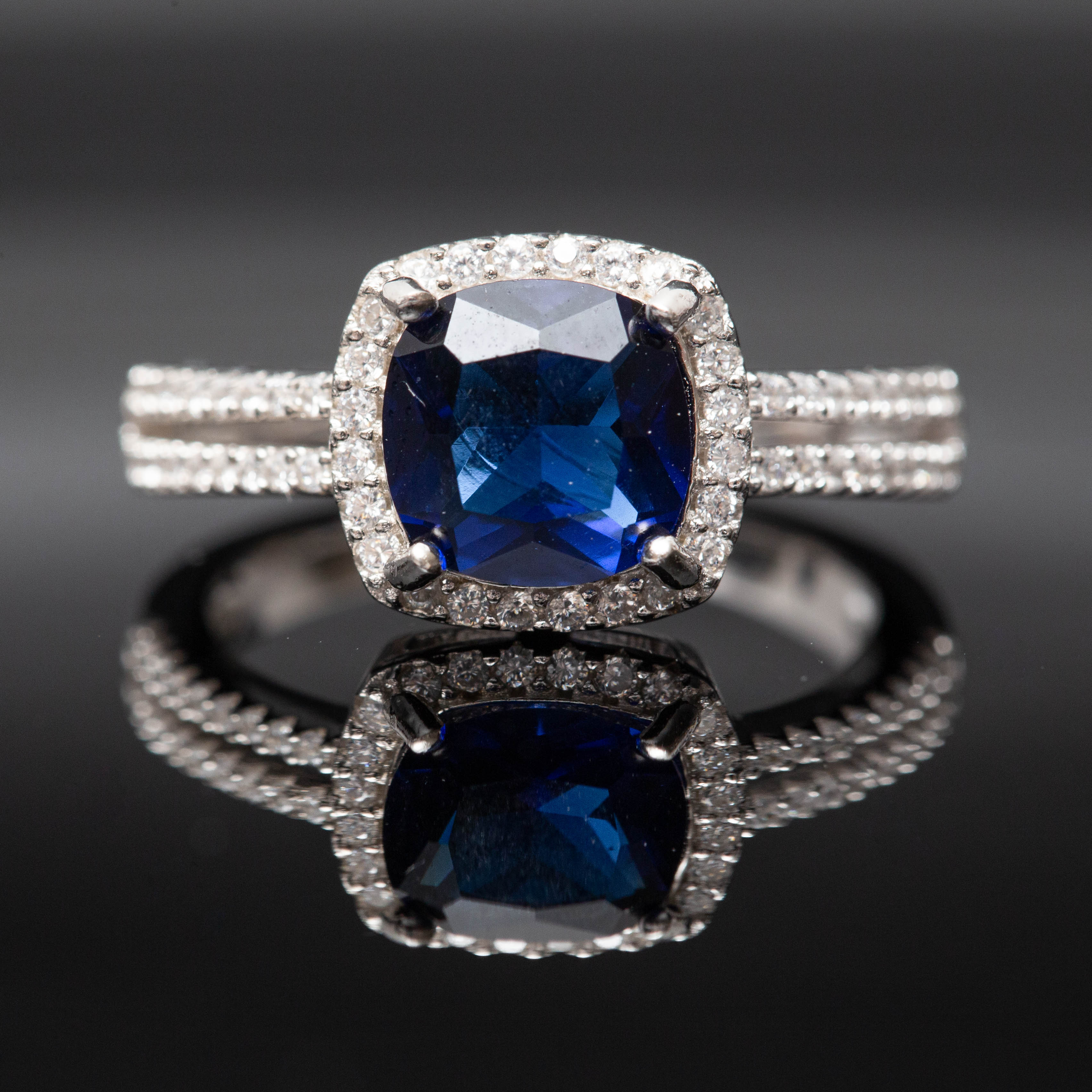 Bague argent Rhodié garanti new avec une pierre Blue