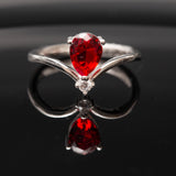 Bague argent Rhodié garanti new avec une pierre Rouge