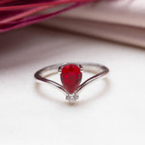 Bague argent Rhodié garanti new avec une pierre Rouge