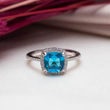 Bague argent Rhodié garanti new avec une pierre Blue ciel carré