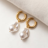 Boucles Acier tendance avec une grande perle blanche