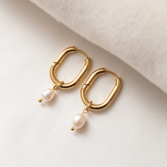 Boucles Acier tendance avec une petite perle blanche