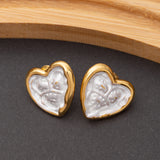 Boucles d'oreilles en acier inoxydable, qualité garantie