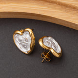 Boucles d'oreilles en acier inoxydable, qualité garantie