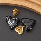 Boucles d'oreilles en acier inoxydable, qualité garantie