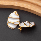 Boucles d'oreilles en acier inoxydable, qualité garantie