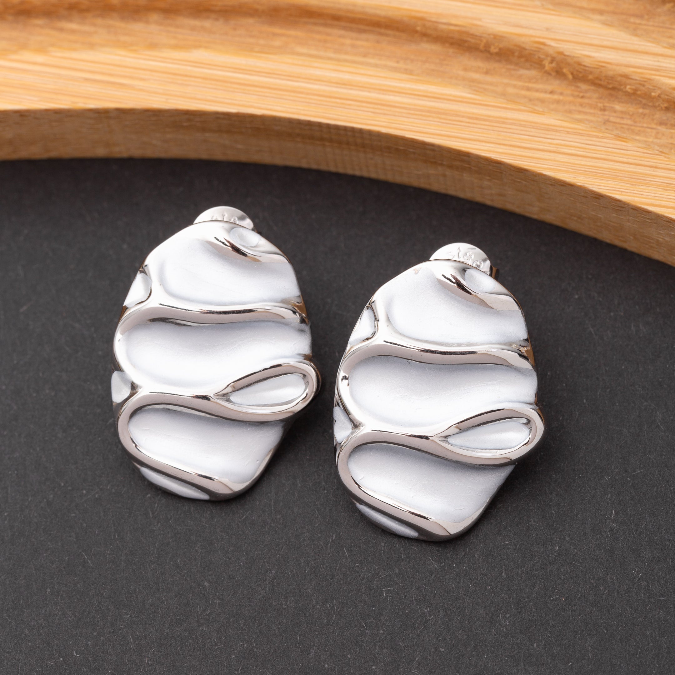Boucles d'oreilles en acier inoxydable, qualité garantie