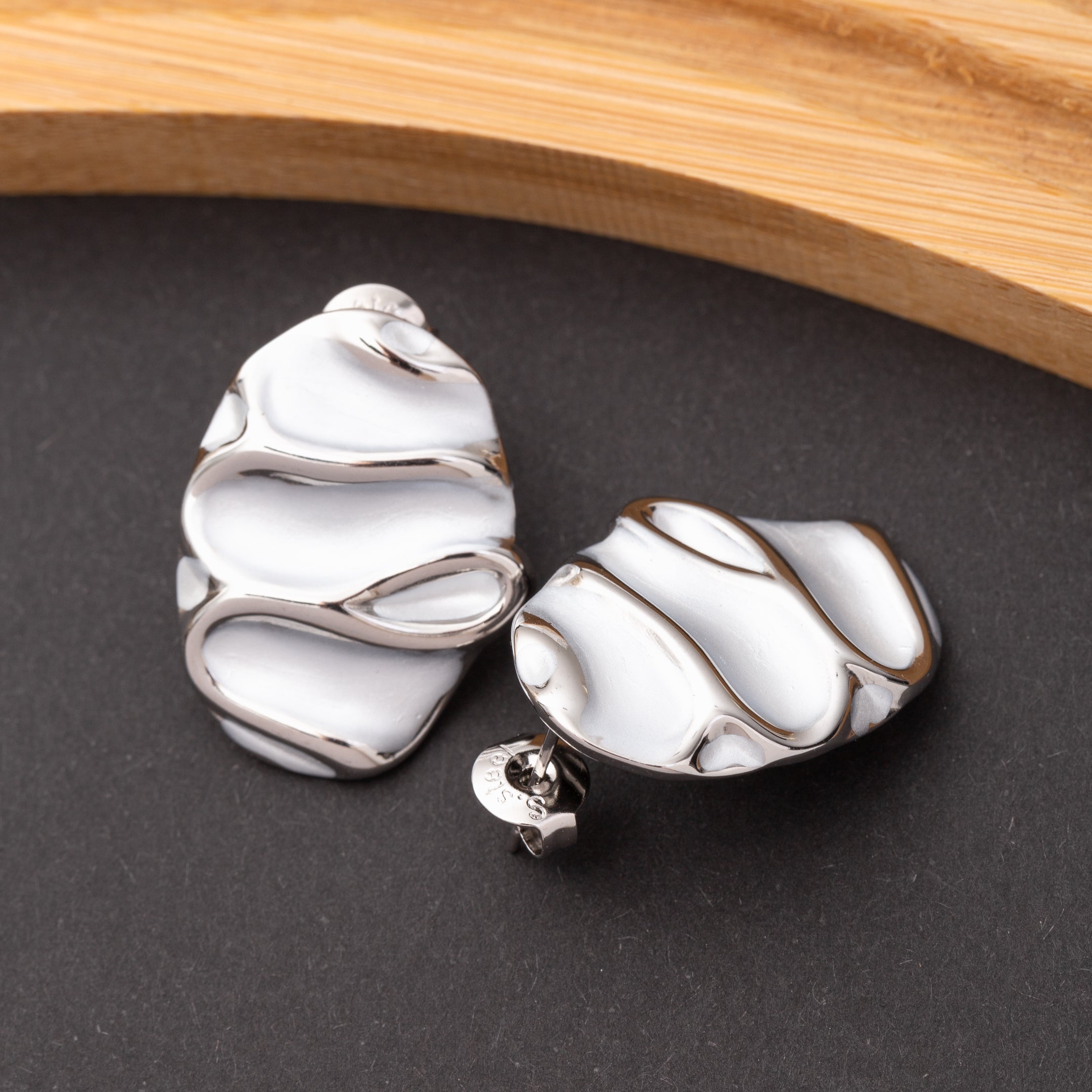 Boucles d'oreilles en acier inoxydable, qualité garantie
