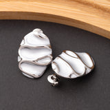 Boucles d'oreilles en acier inoxydable, qualité garantie