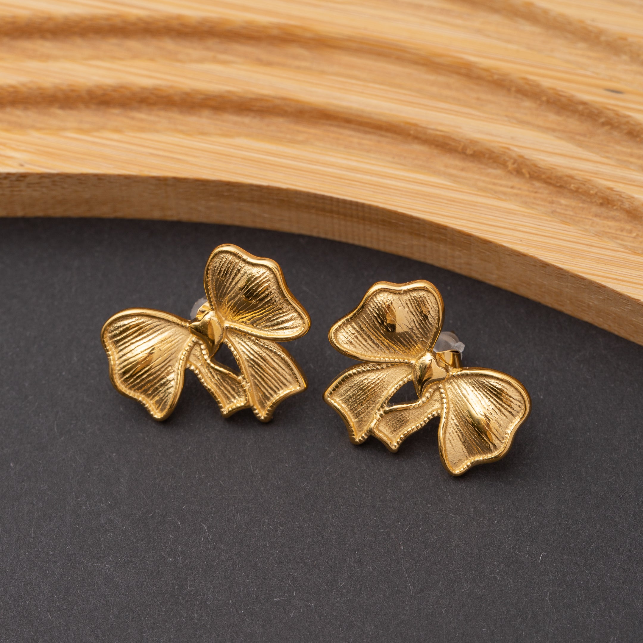 Boucles d'oreilles Papillonne en acier inoxydable, qualité garantie