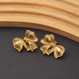 Boucles d'oreilles Papillonne en acier inoxydable, qualité garantie