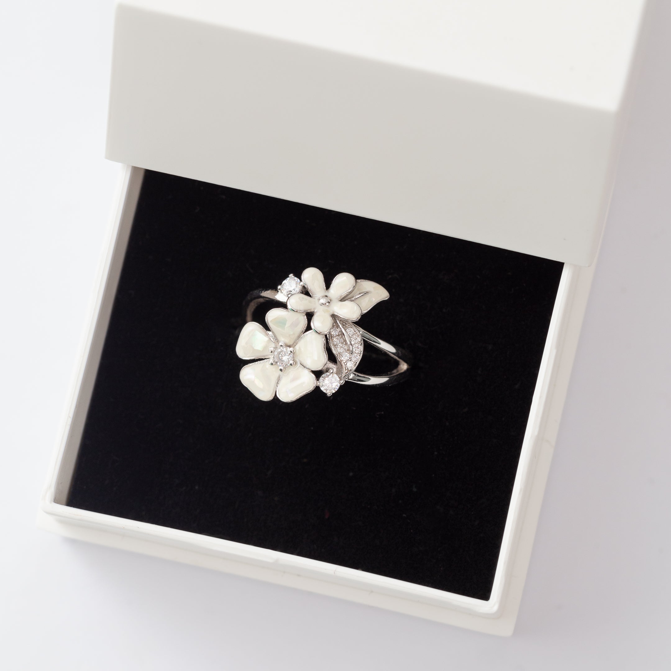 Bague Argent Rhodié garanti fleur papillon de nacre soldeargent - 40%
