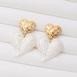 Boucles d'oreilles en acier inoxydable garanties