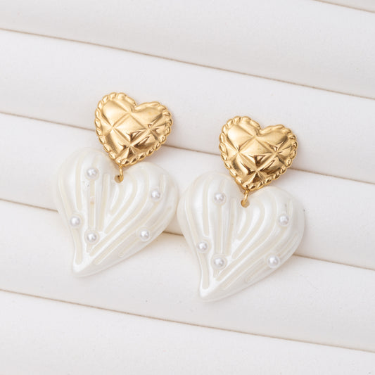 Boucles d'oreilles en acier inoxydable garanties