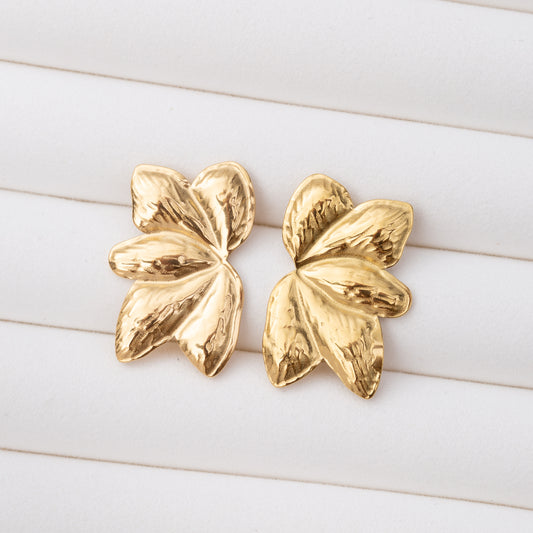 Boucles d'oreilles en acier inoxydable garanties