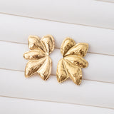 Boucles d'oreilles en acier inoxydable garanties