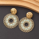 Boucles d'oreilles en acier inoxydable garanties