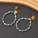 Boucles d'oreilles Pierre Appitite en acier inoxydable