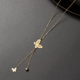 Collier Acier doré tendance avec un 2 motifs papillons