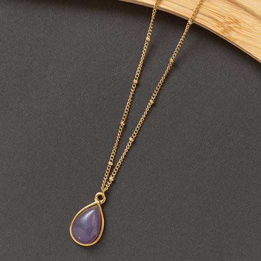 Collier en acier en promotion avec pierre améthyste.