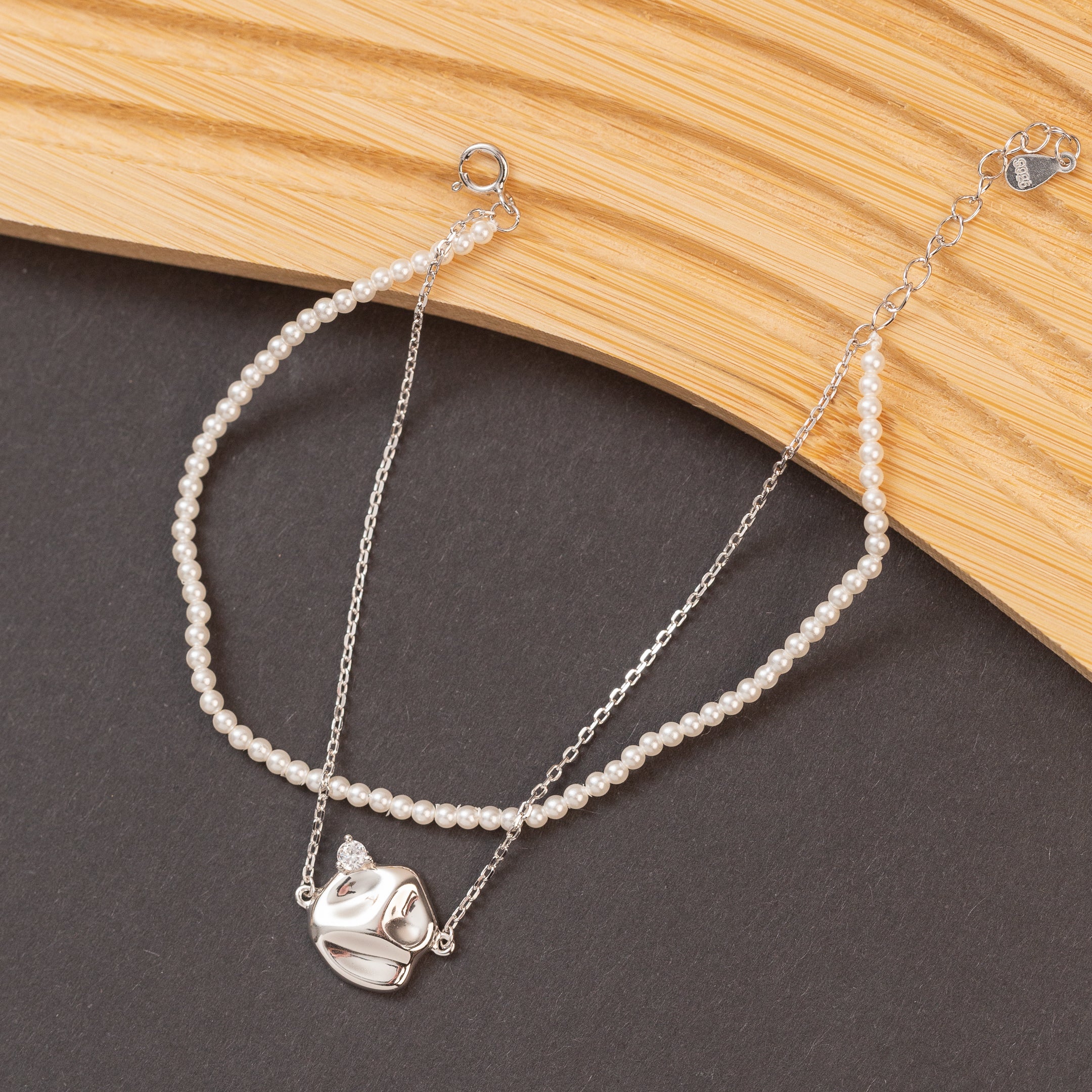 Gourmette en argent avec deux rangs de chaîne