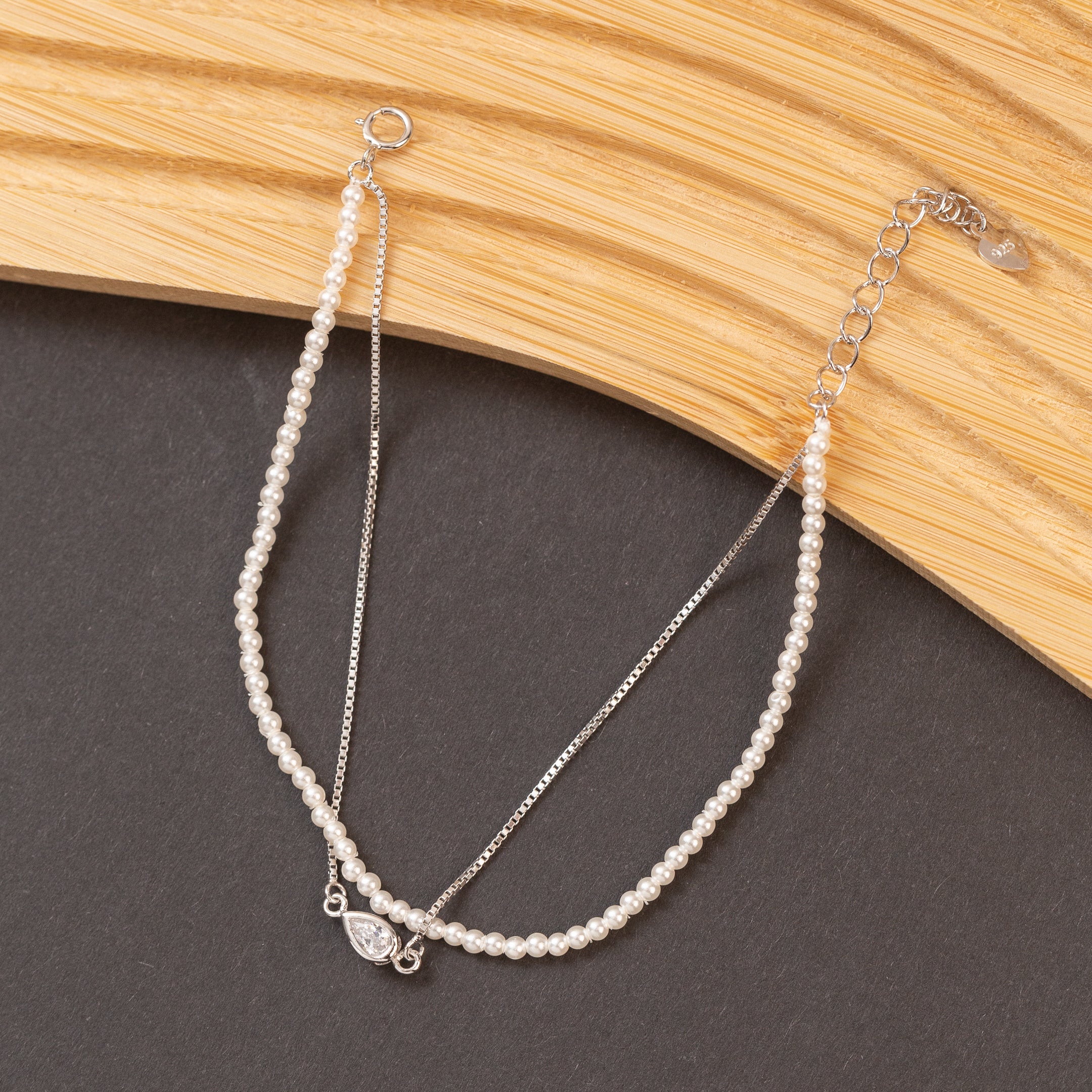 Gourmette en argent avec deux rangs de chaîne