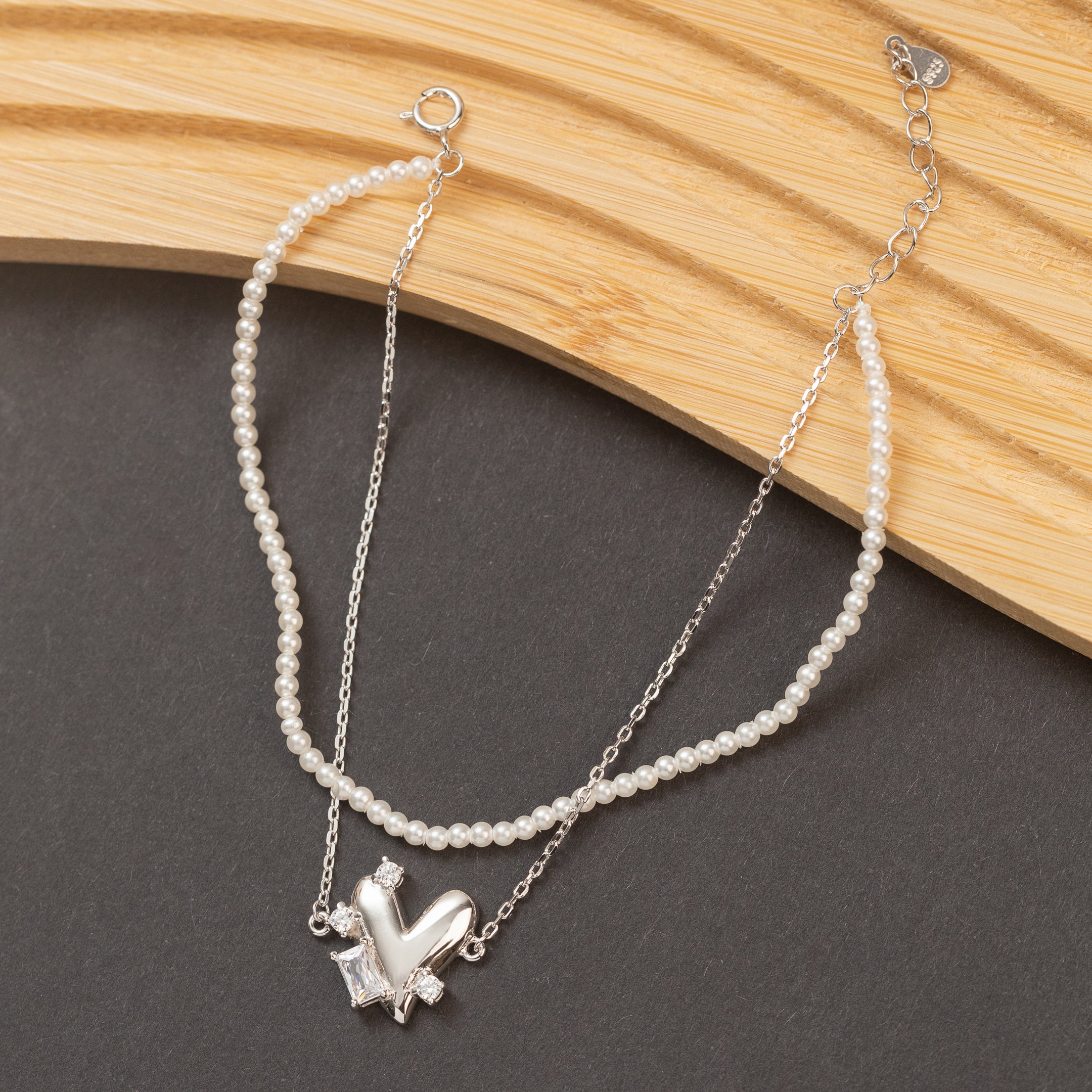 Gourmette en argent avec deux rangs de chaîne