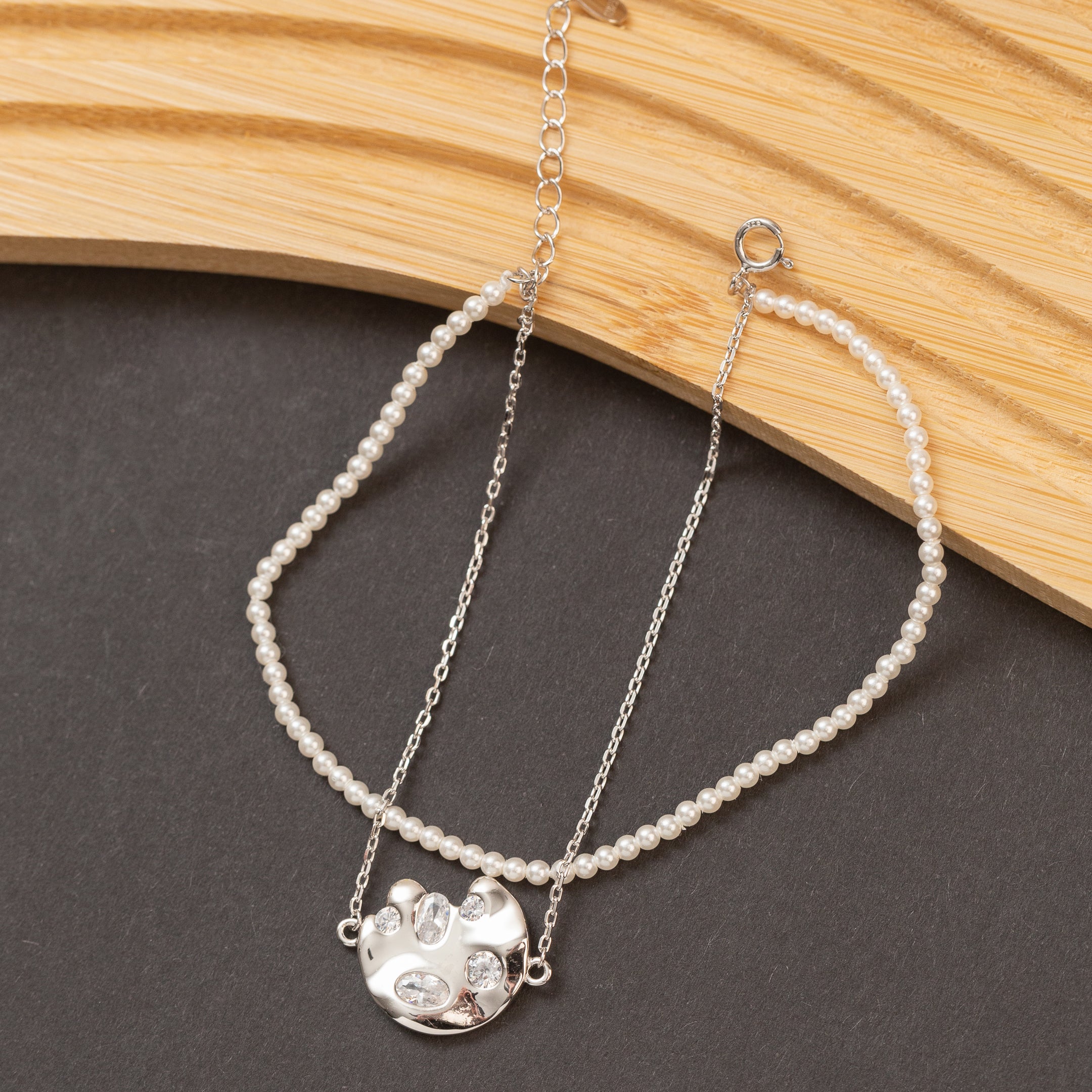 Gourmette en argent avec deux rangs de chaîne