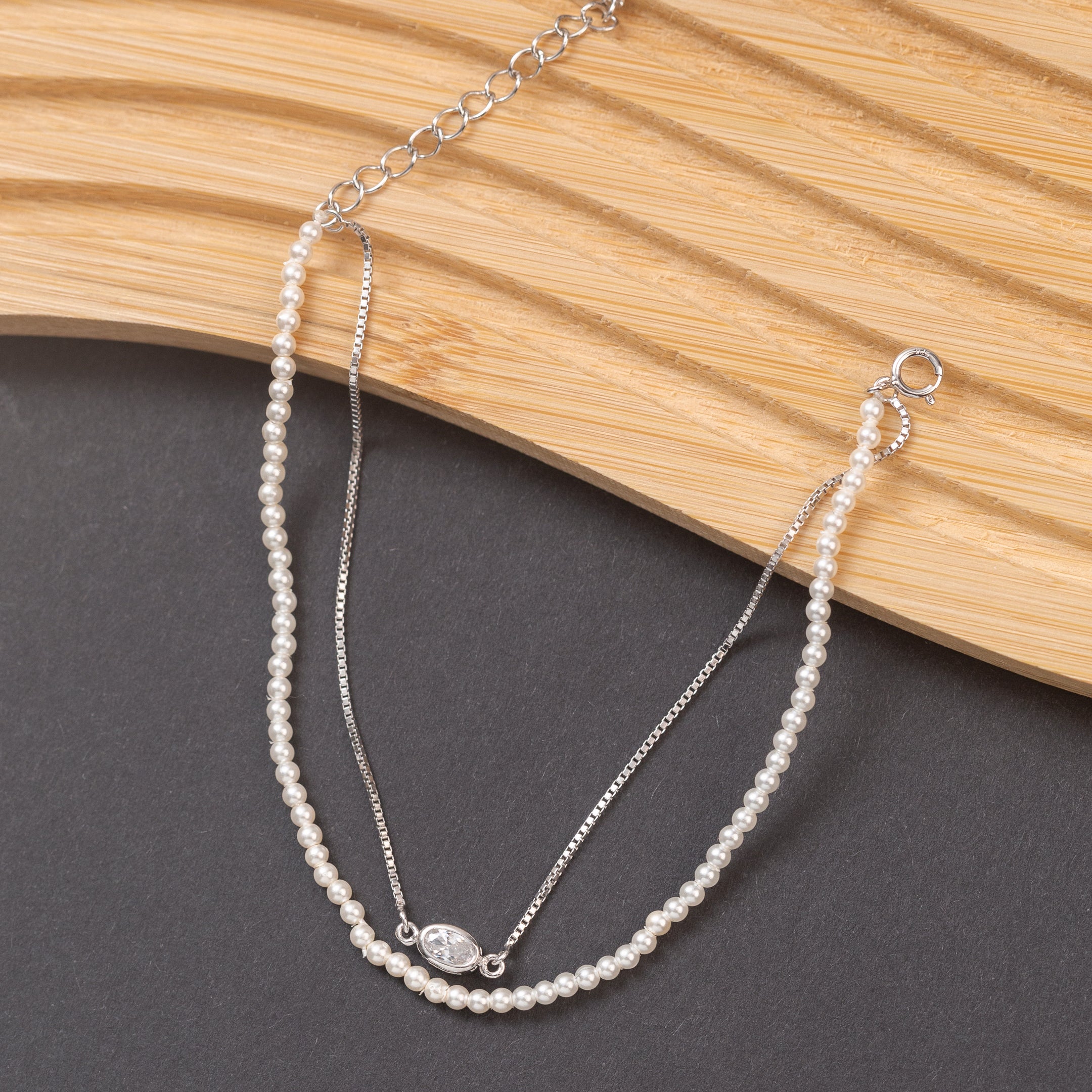 Gourmette en argent avec deux rangs de chaîne