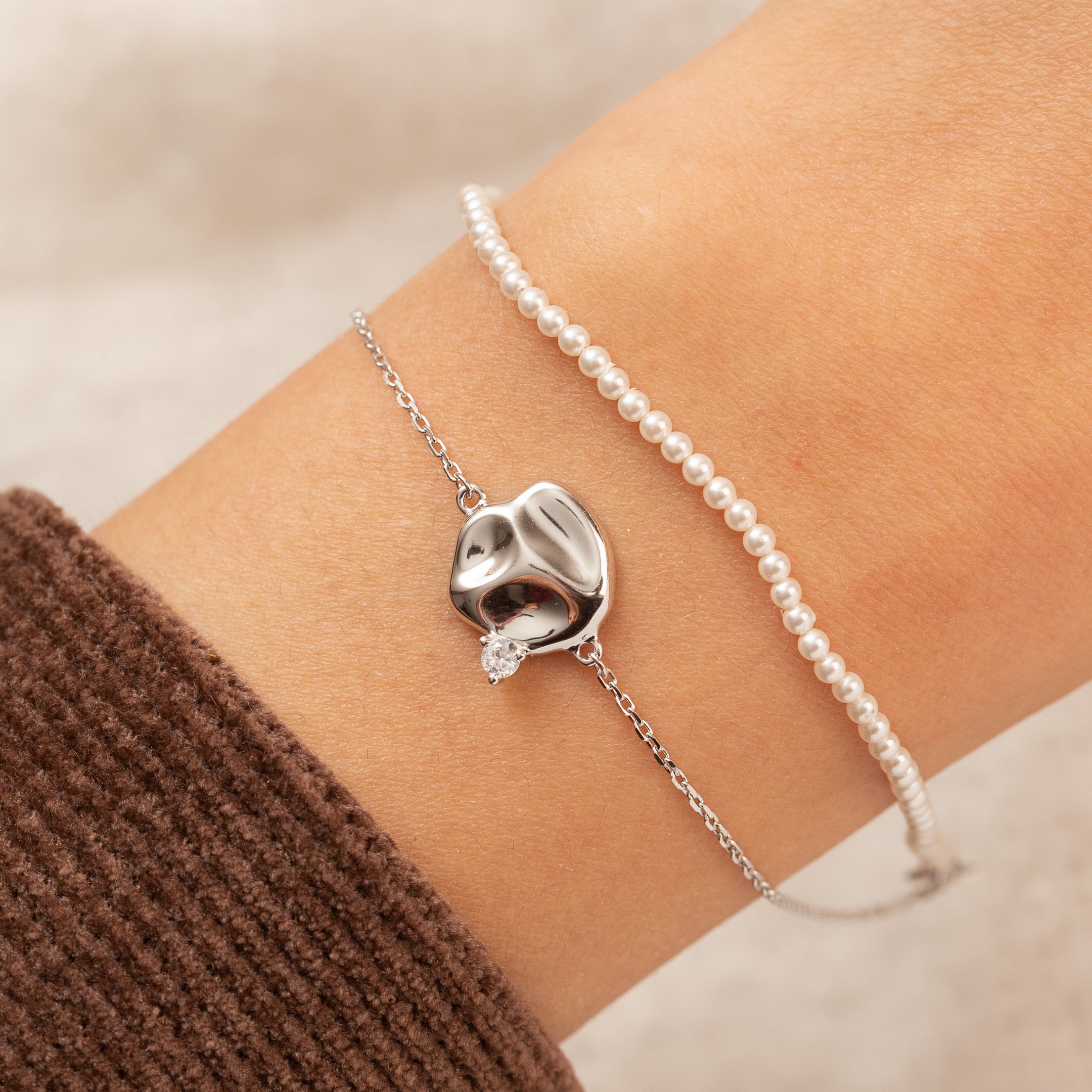 Gourmette en argent avec deux rangs de chaîne