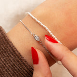 Gourmette en argent avec deux rangs de chaîne