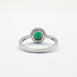 خاتم فضة مطلي بالروديوم مكفول بحجر أخضر مستدير