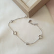Gourmette Argent Rhodié Garanti trèfle fine 2 pierres