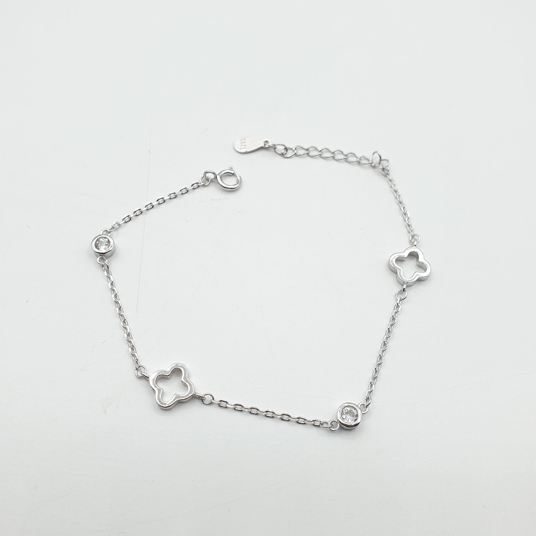 Gourmette Argent Rhodié Garanti trèfle fine 2 pierres